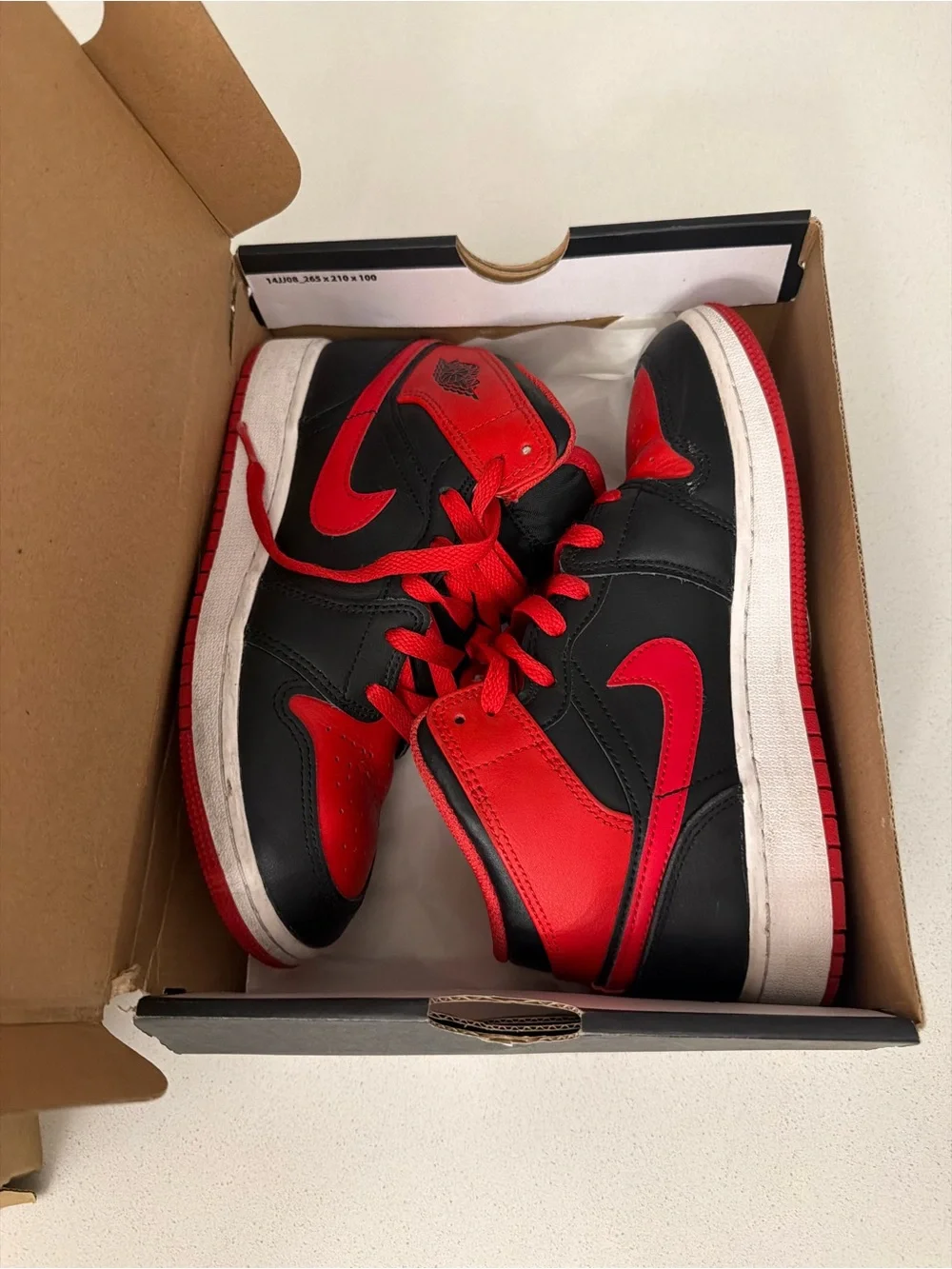 Nike Black and Red Retro High-Top Sneakers